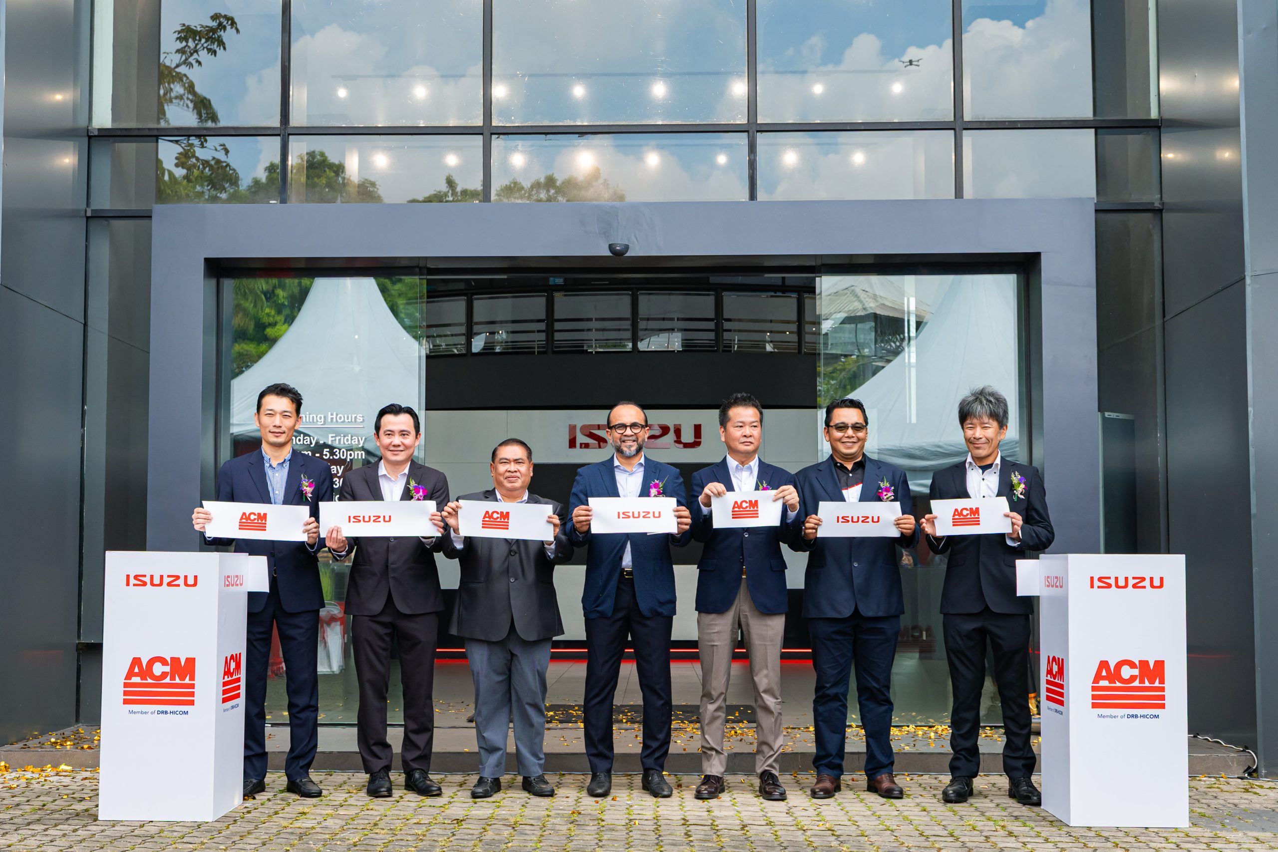 ACM OPENS UPGRADED JB OUTLET